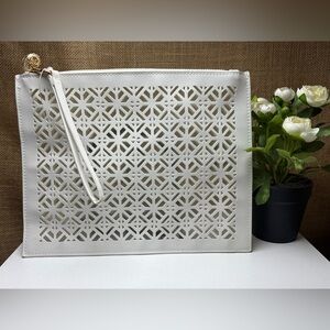 Tory Burch large laser cutout zip clutch pouch White clear pvc lining gold charm